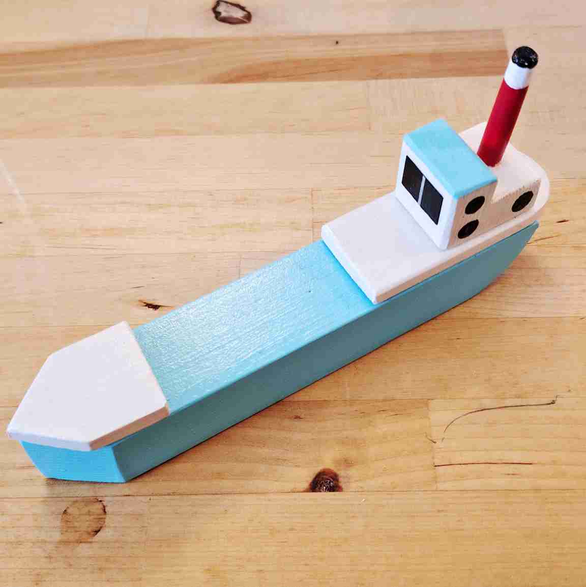 Small Pale Blue fishing boat by David Fry (COM)