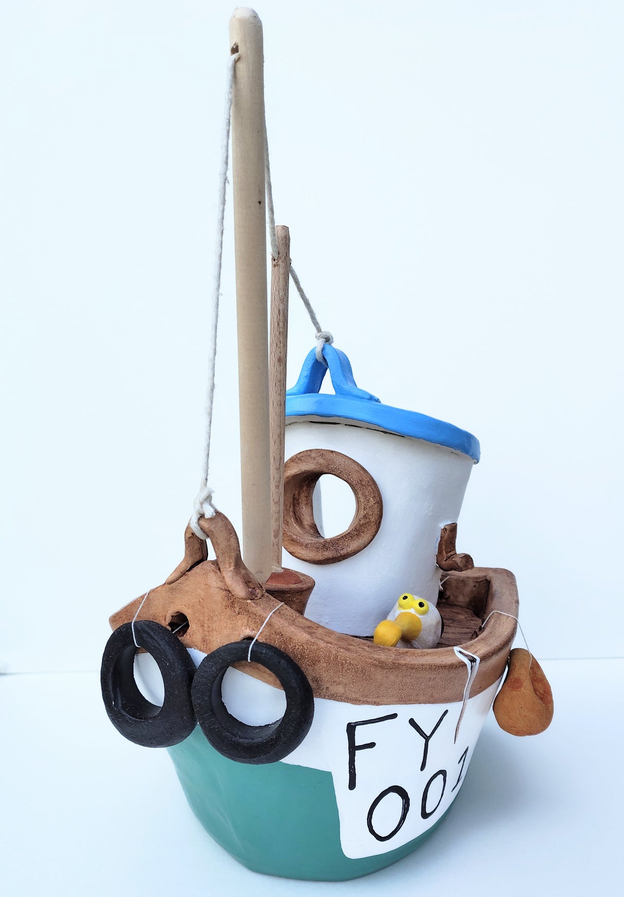 FY001 medium ceramic fishing boat by Louise Thorn