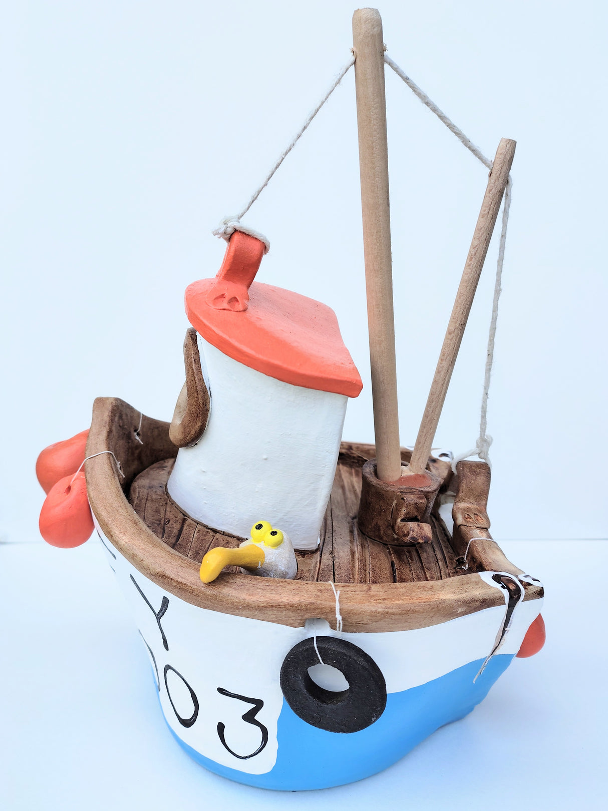 FY003 medium blue ceramic fishing boat by Louise Thorn
