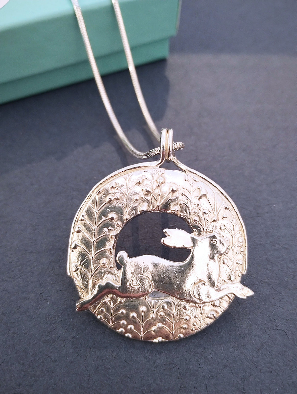 Jumping Hare silver pendant necklace.