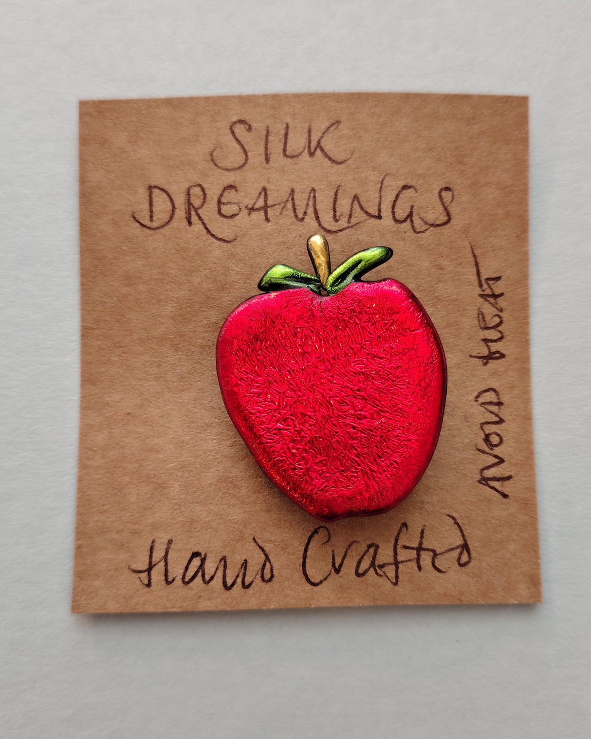 Silk Dreamings apple brooch