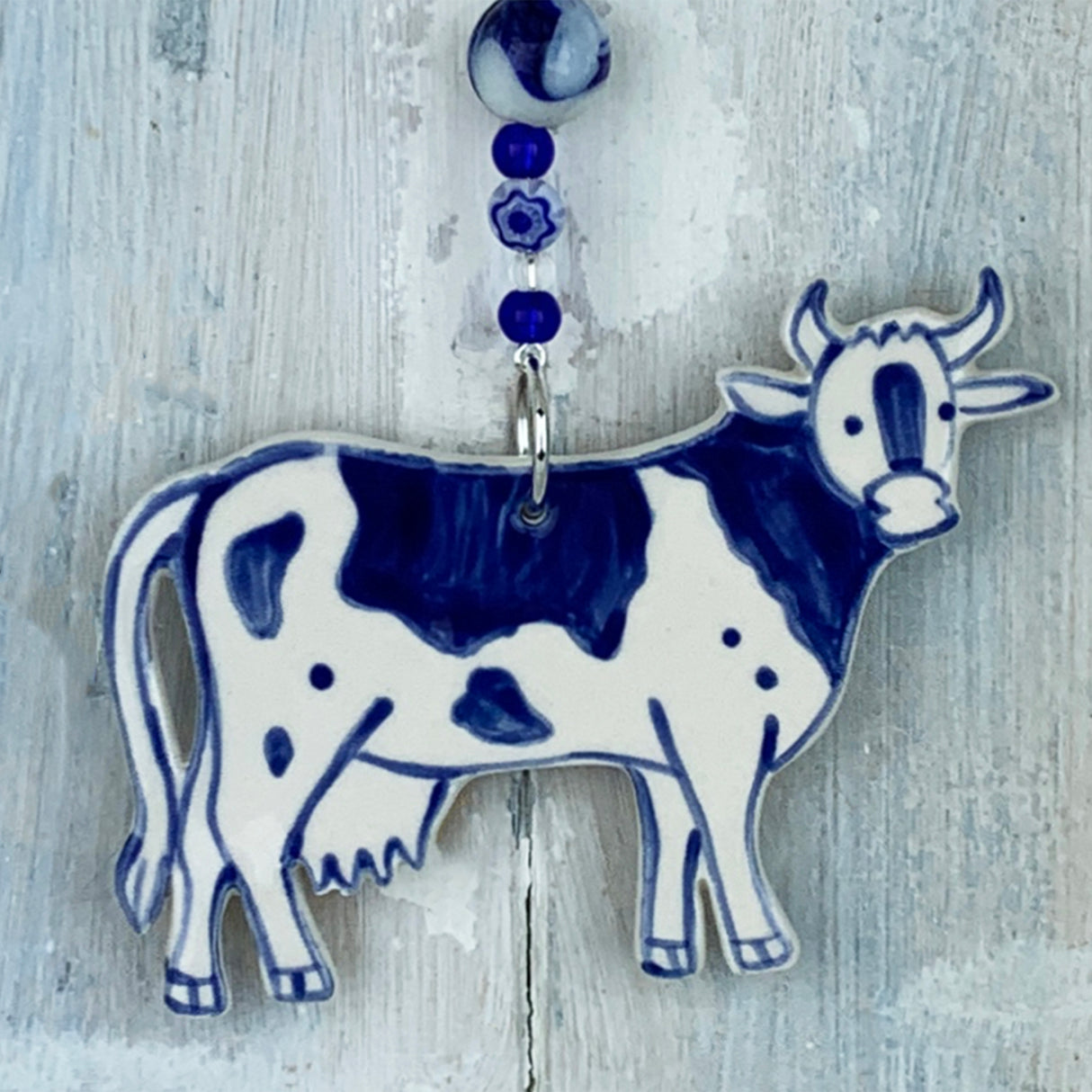 Handmade blue cow ceramic decoration