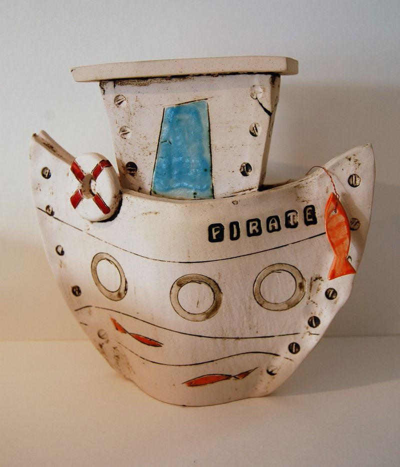 Large ceramic fishing boat by Iveta Goddard
