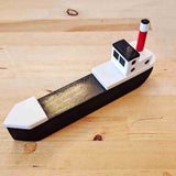 Small black fishing boat by David Fry (COM)