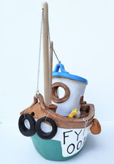 FY001 medium ceramic fishing boat by Louise Thorn