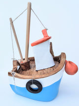 FY003 medium blue ceramic fishing boat by Louise Thorn