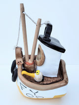 FY05 small yellow ceramic fishing boat by Louise Thorn