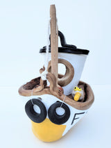 FY05 small yellow ceramic fishing boat by Louise Thorn