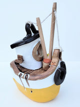 FY05 small yellow ceramic fishing boat by Louise Thorn