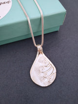 Flower Heads silver pendant necklace.