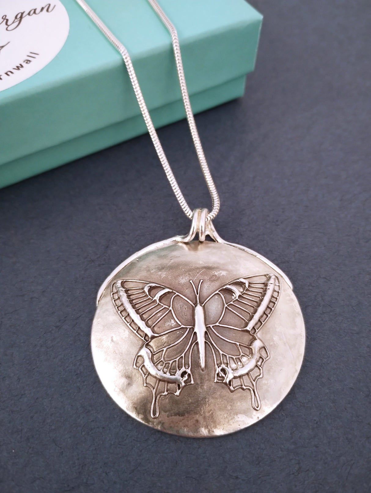 Butterfly silver pendant necklace.
