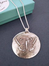 Butterfly silver pendant necklace.