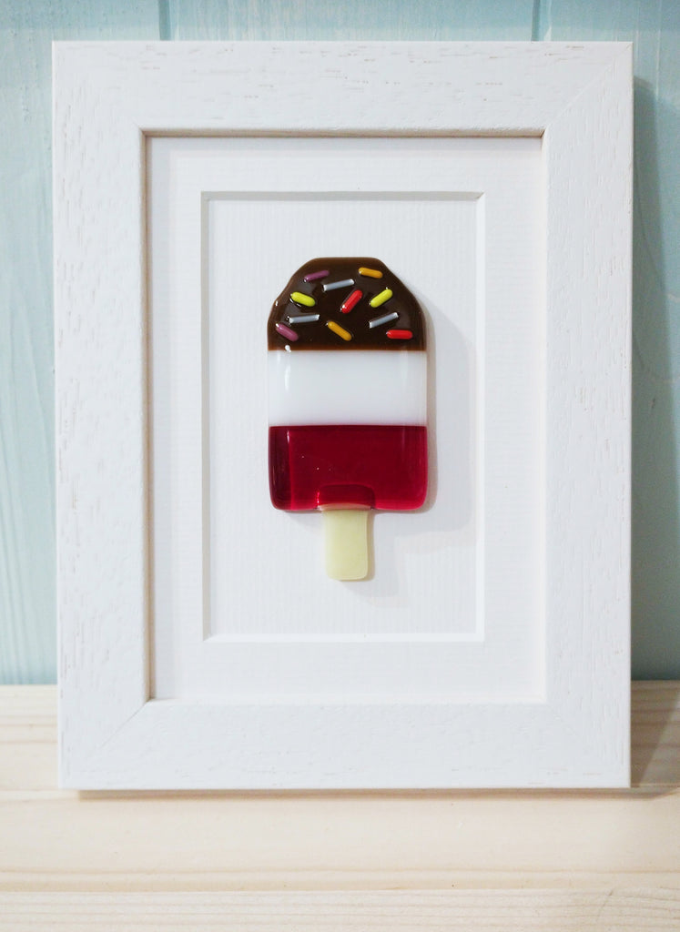 fused glass fab lolly picture in a white frame by Niko Brown