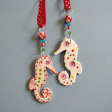 Handmade colourful seahorse hanging decoration