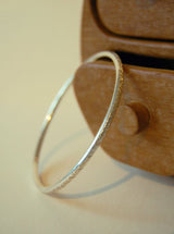 Amy R Lee criss cross silver bangle