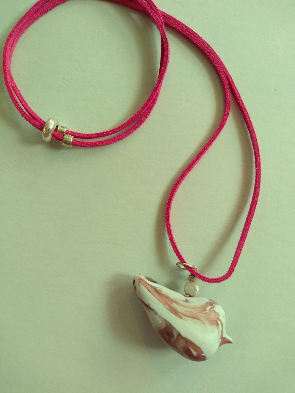 Birdy Stone Pebble pendant by Angel Bones