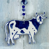 Handmade blue cow ceramic decoration