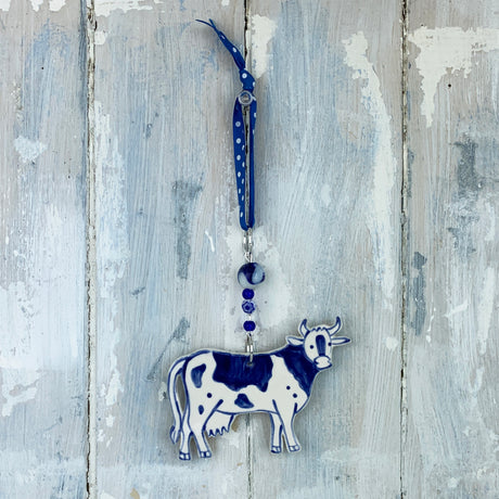 Handmade blue cow ceramic decoration
