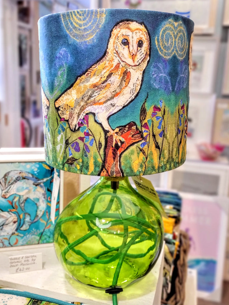 barn owl lampshade shown on a glass tables lamp base by Dawn Maciocia