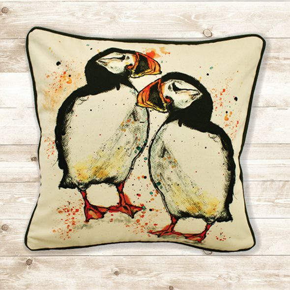 pair of puffins on a cream background cotton cushion with black piping