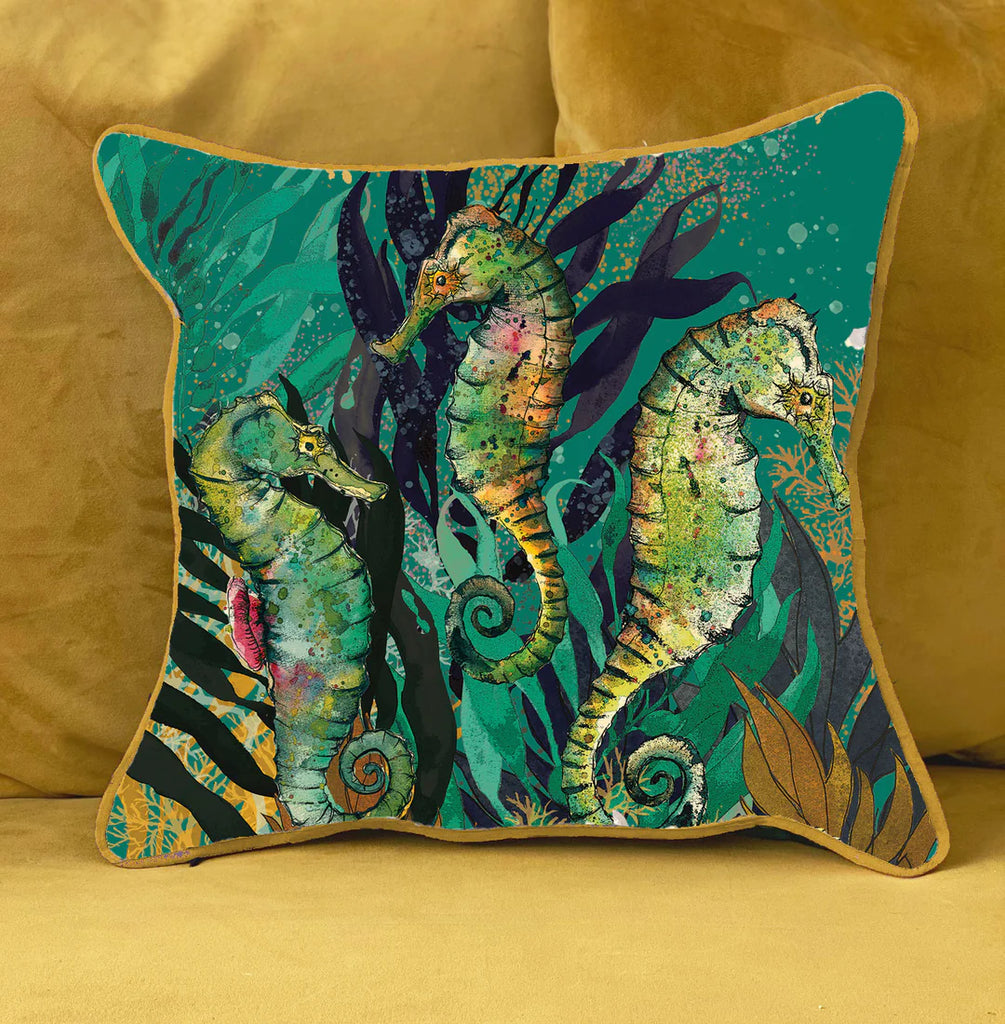 seahorses on a teal background cotton cushion with ochre piping