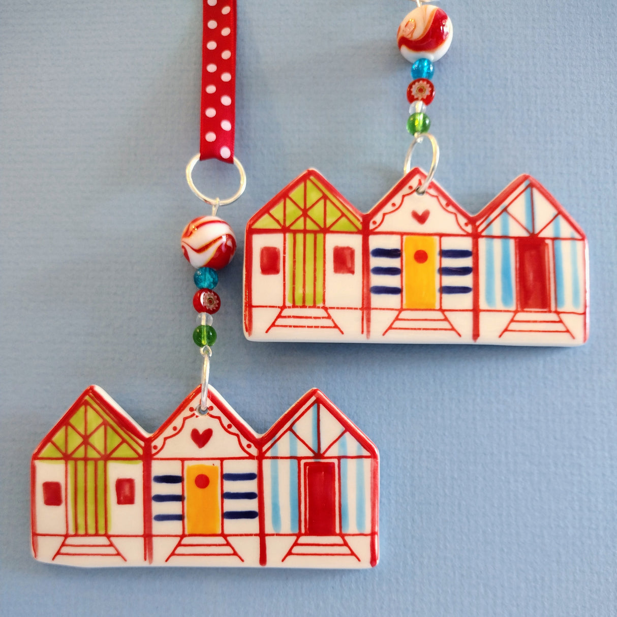 Handmade colourful beach hut decoration