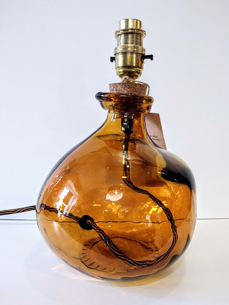 amber coloured glass lamp-base with colourful flex
