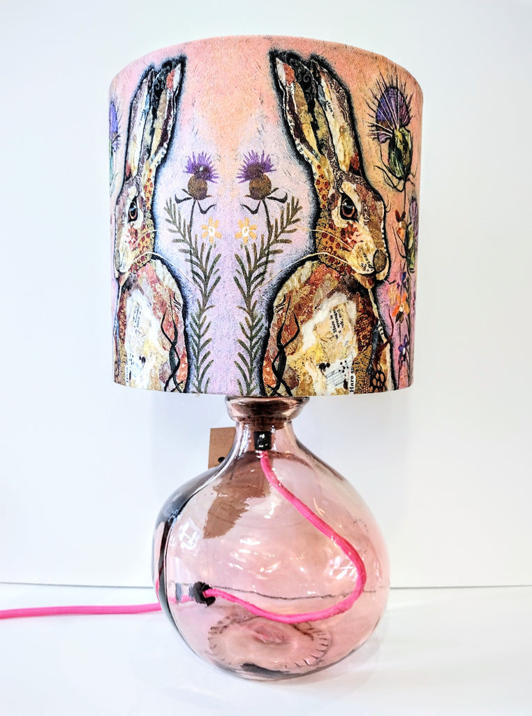pale pink recycled glass lamp-base shown with a pale pink hares lamshade