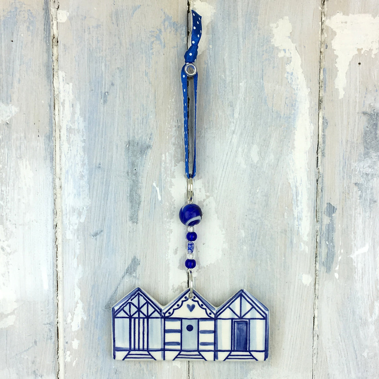 Handmade blue beach hut decoration