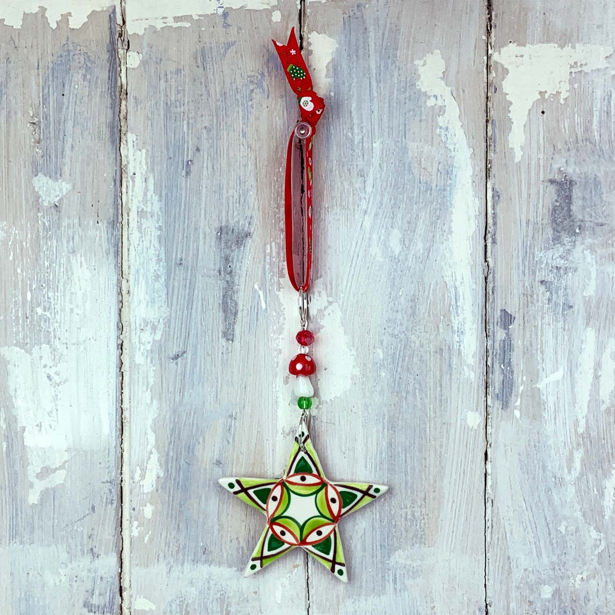 Colourful star ceramic decoration