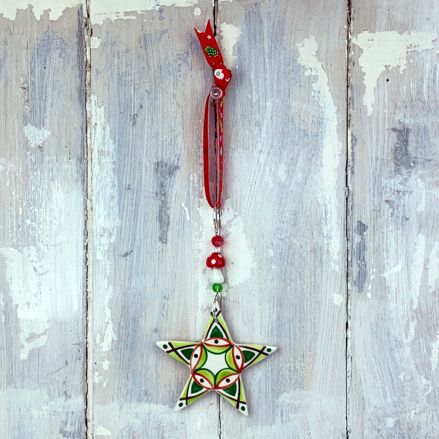 Colourful star ceramic decoration