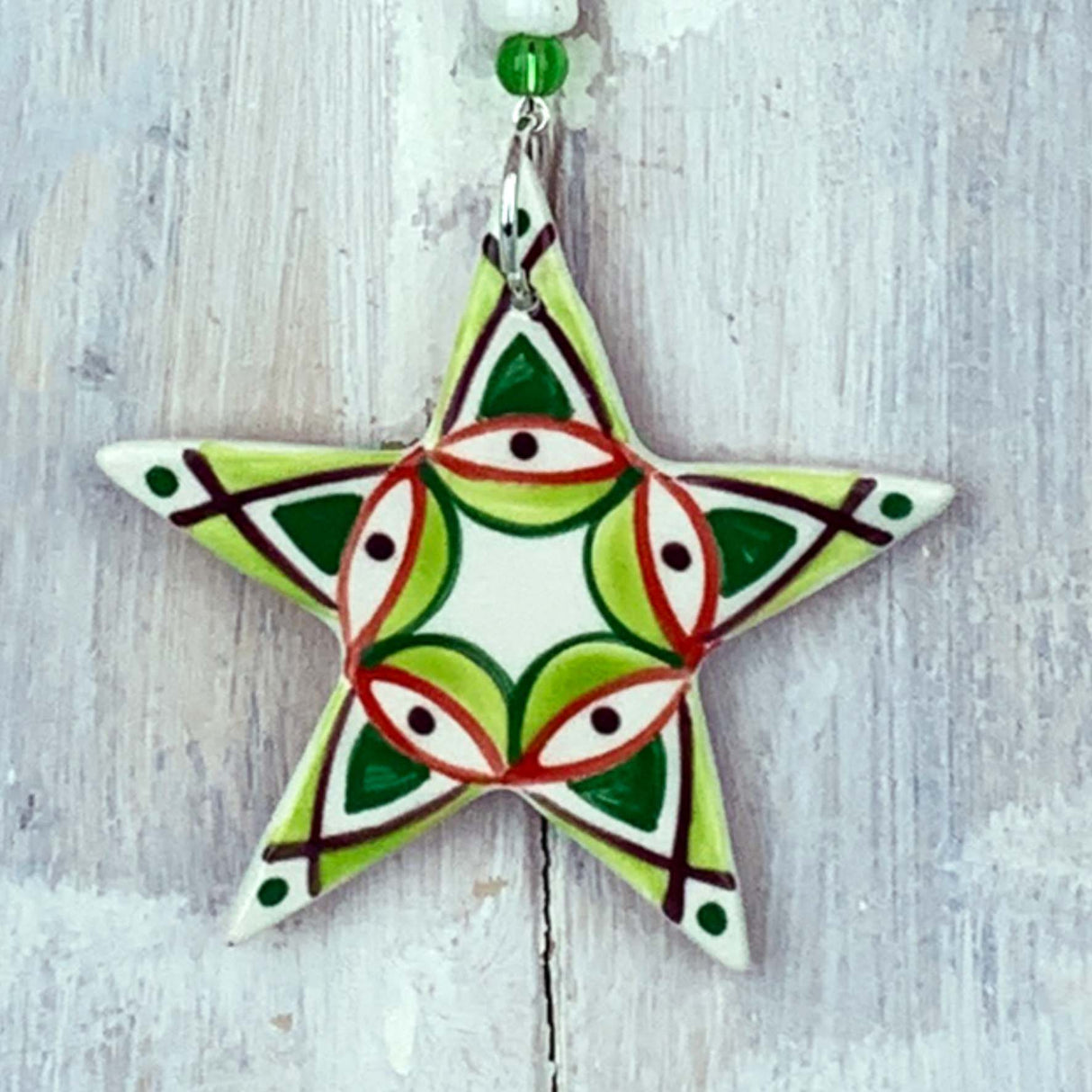 Colourful star ceramic decoration