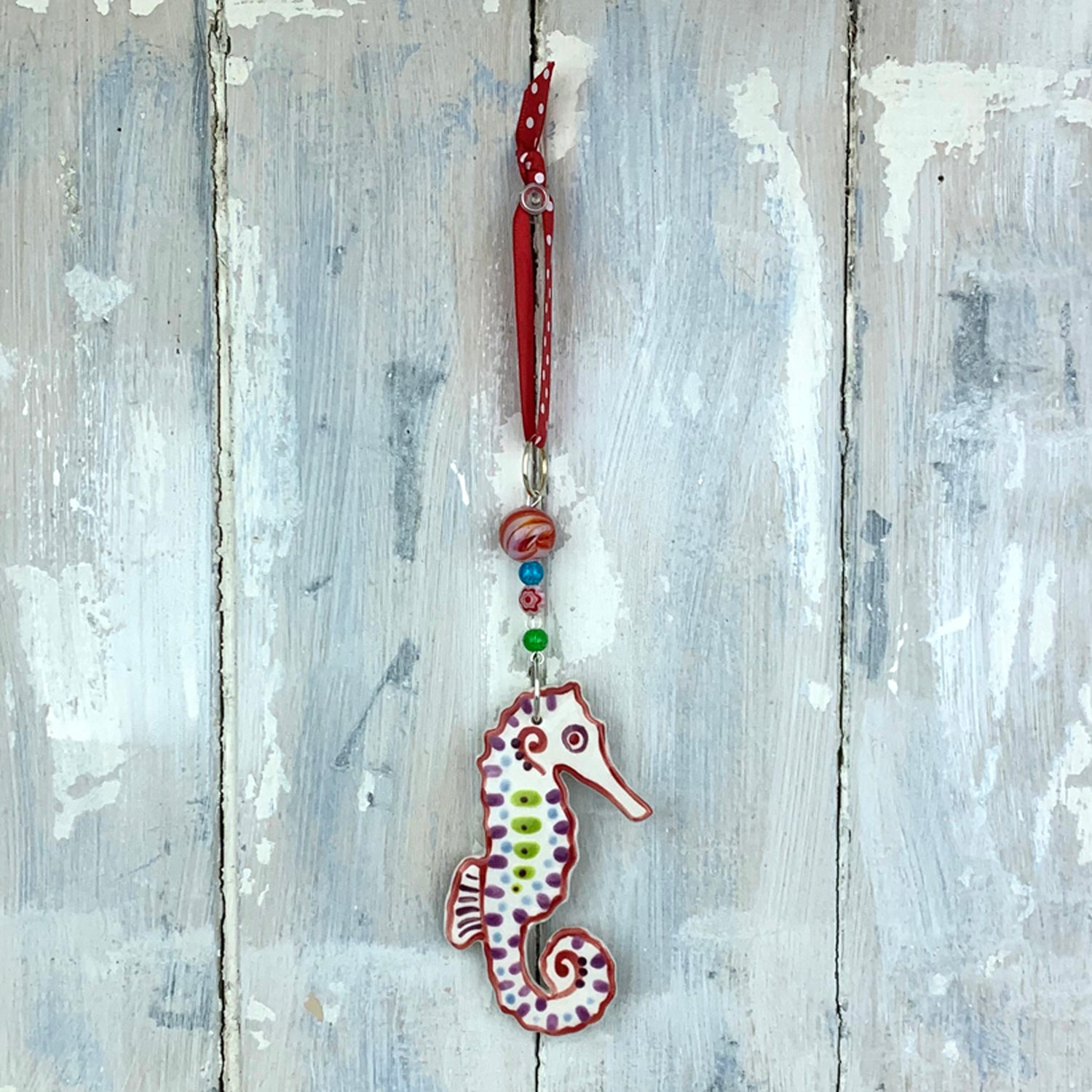 Handmade colourful seahorse hanging decoration